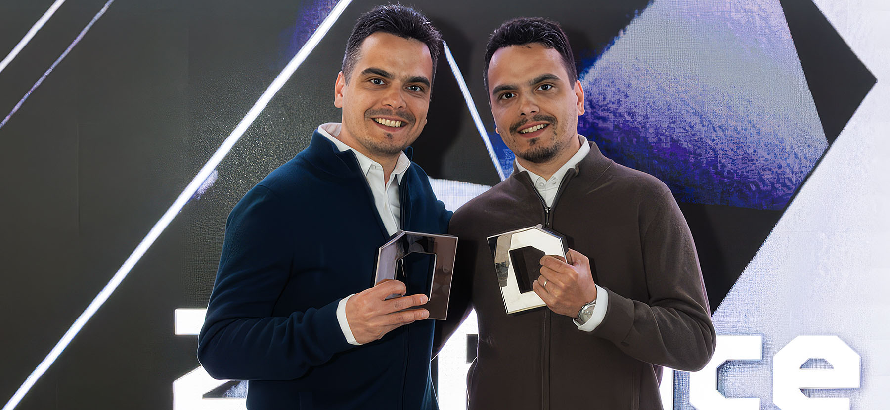 Costin and Horia Oane on stage at the Dieline Awards in New York after winning two Silver Awards.