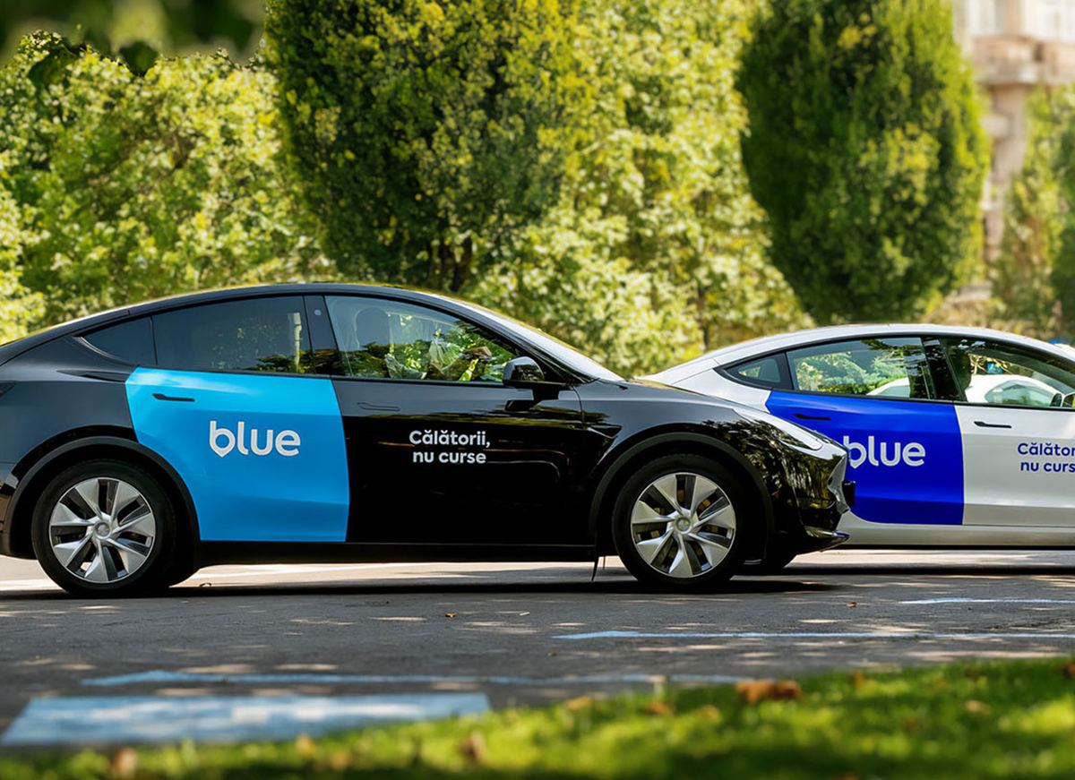 Blue ride-sharing cars with the visual identity created by BroHouse, awarded Gold at Transform Awards Europe 2025